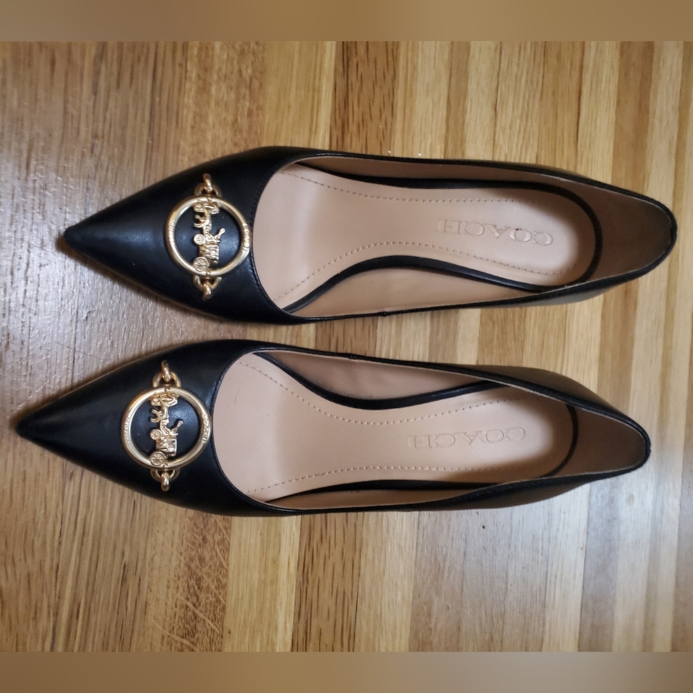 Coach pointed toe black heels with gold coach emblem